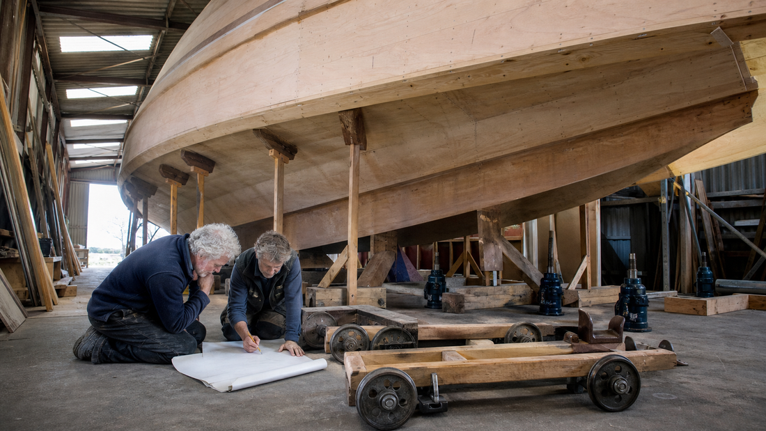Moving the schooner hull out of the workshop